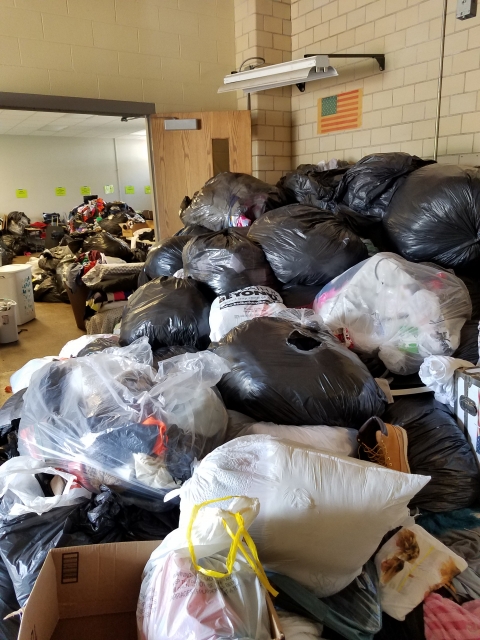 Garbage bags filled with items for Dump & Run