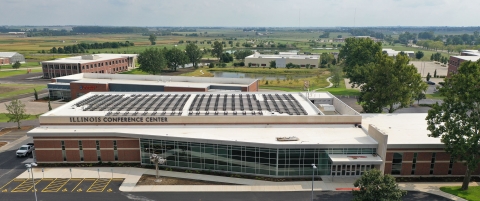 Full view of the new building with a view of the roof and installed solar panels. 