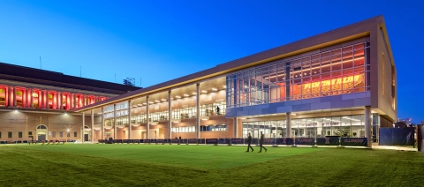 View of the back of the building from an adjacent practice field.